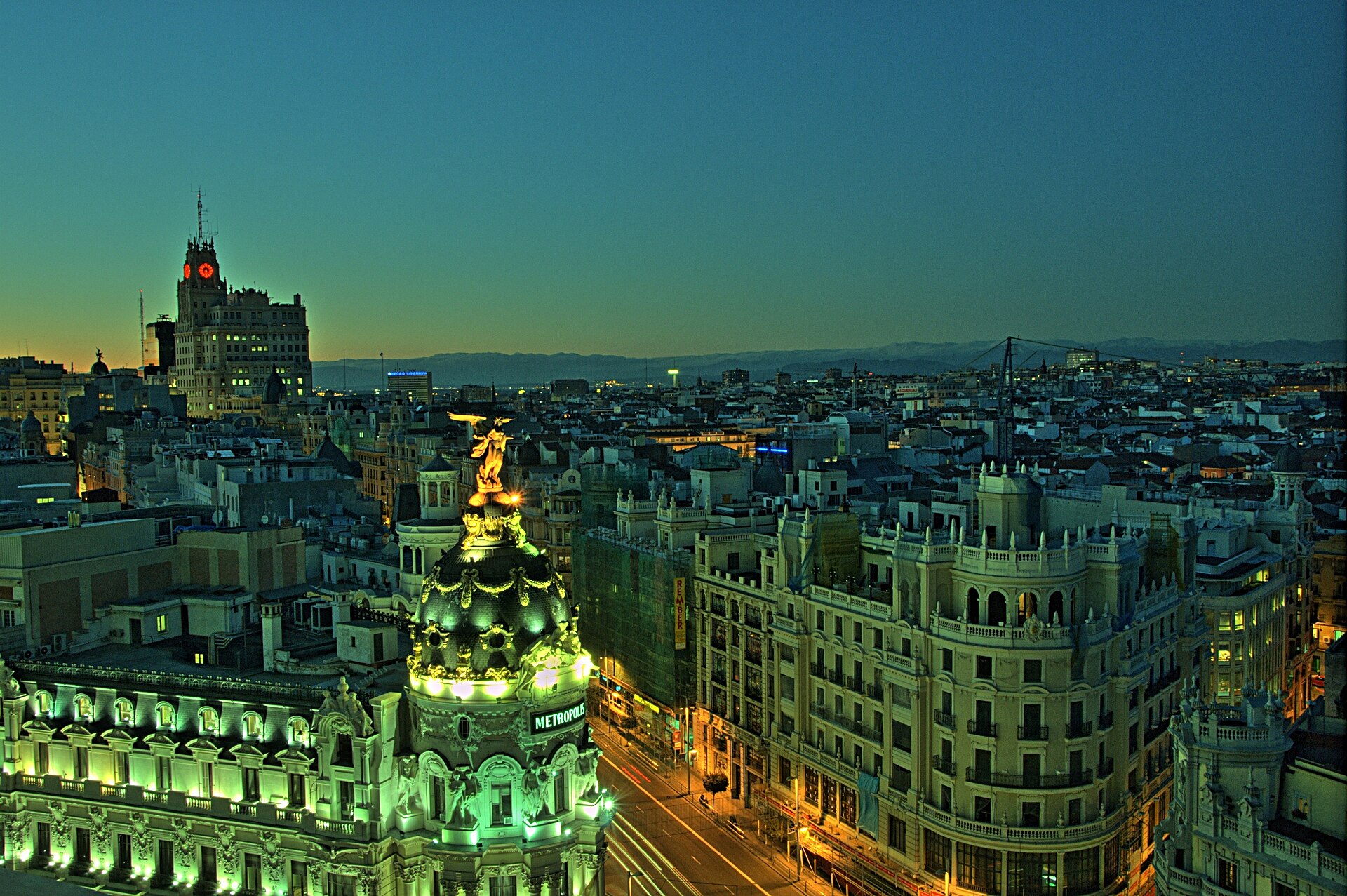 Gran Via and central Madrid at dusk, the city where the campus is based