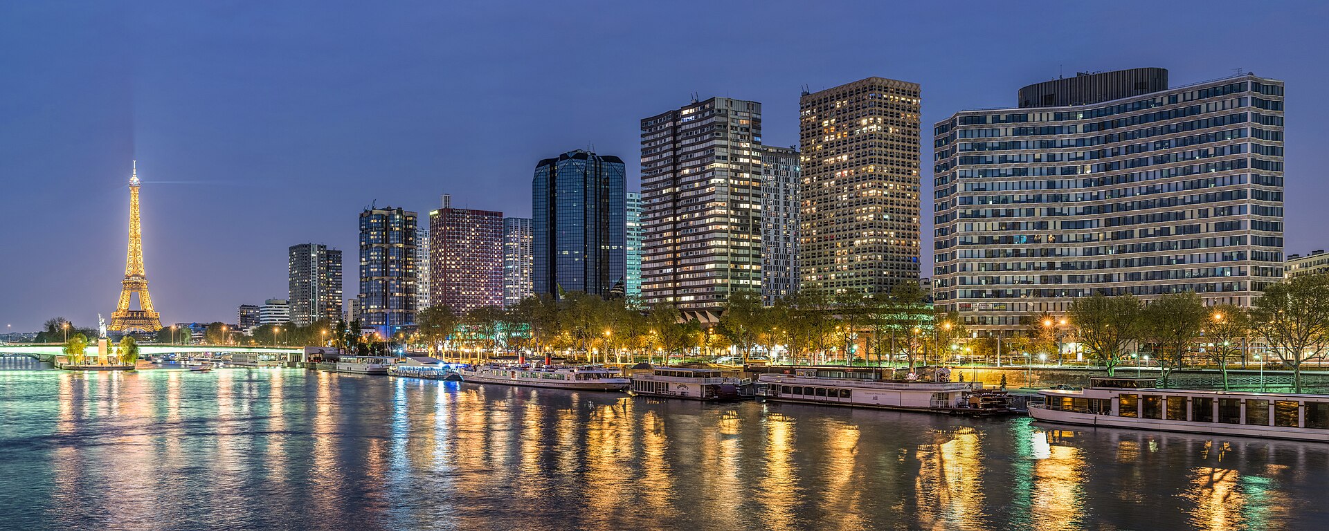The Seine and the Paris skyline at dusk, the city where the school is based